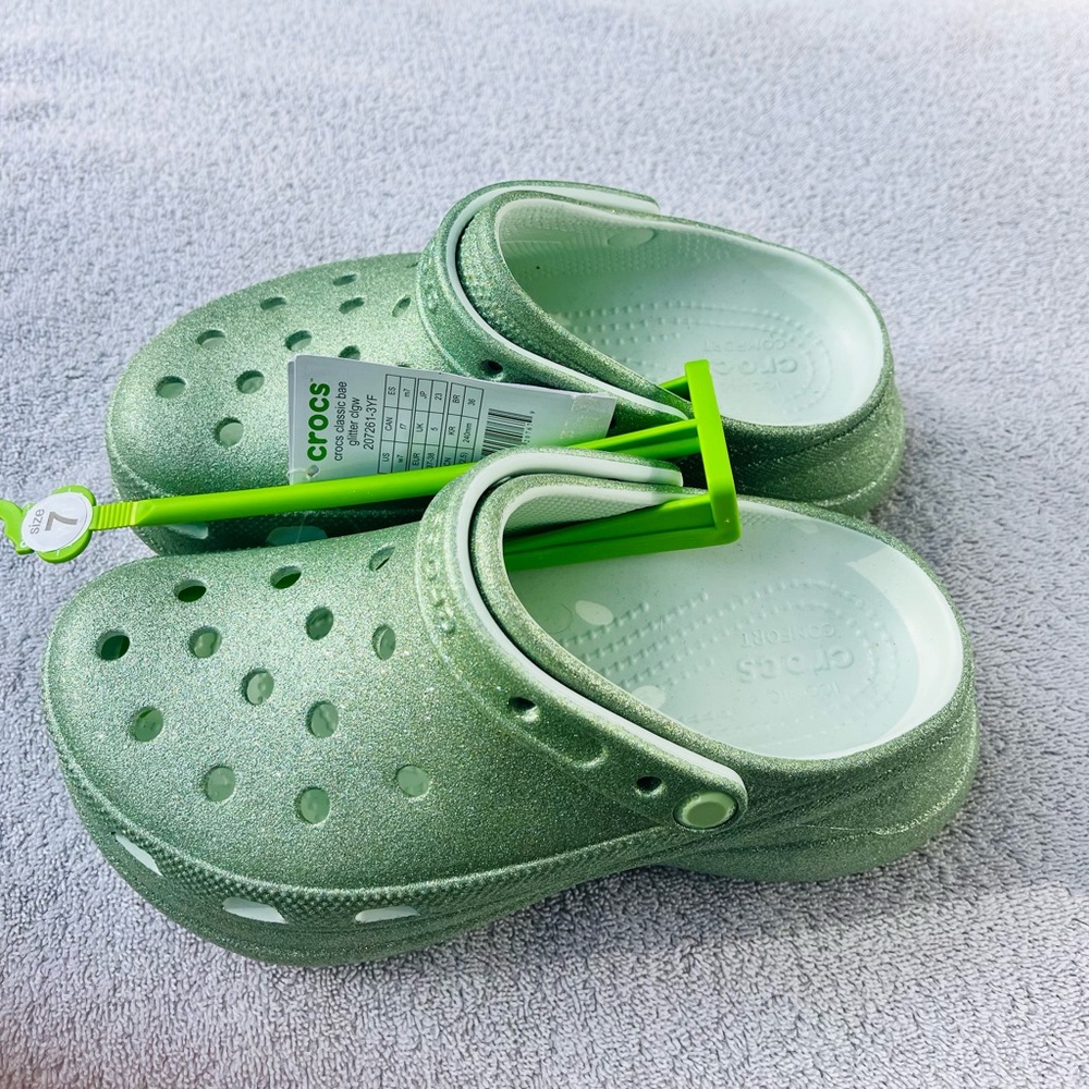CROCS (women’s) 
Glitter Green - feel’n kinda    “Wicked”?